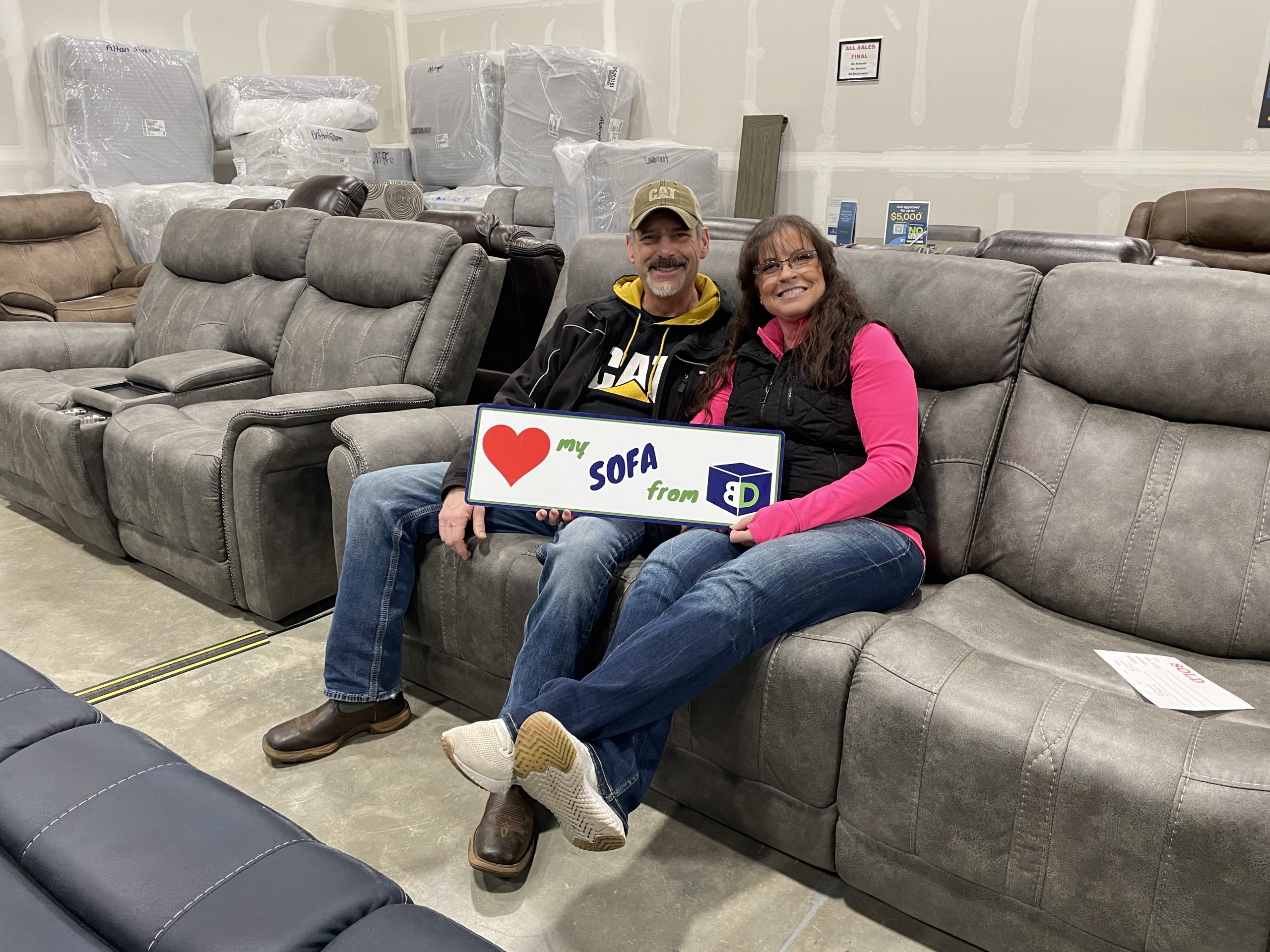 BoxDrop North Idaho customer Pamela with her new Morrison Stone reclining sofa